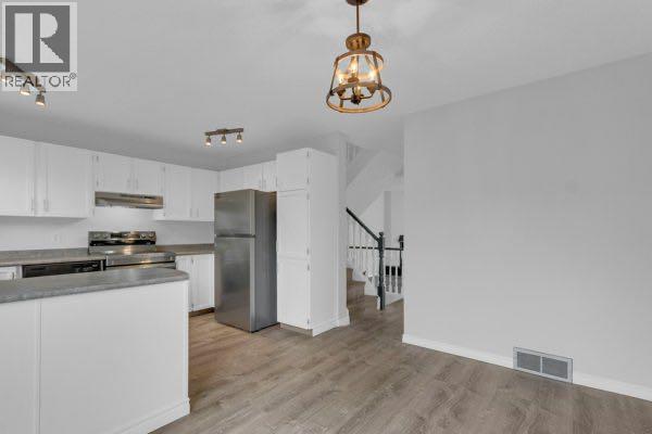 220 Cedarbrook Bay SW, Calgary, Alberta  T2W 4R4 - Photo 10 - A2301638