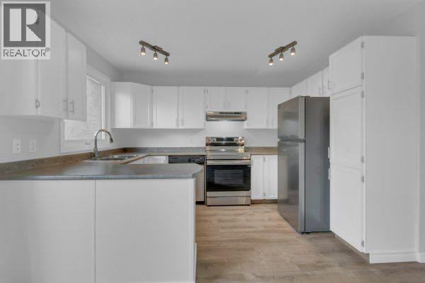 220 Cedarbrook Bay SW, Calgary, Alberta  T2W 4R4 - Photo 6 - A2301638