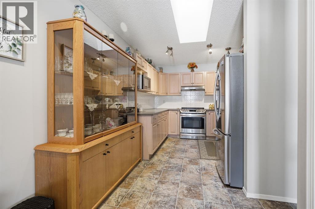 216 Valley Ridge Heights Nw, Calgary, Alberta  T3B 5T3 - Photo 11 - A2297751