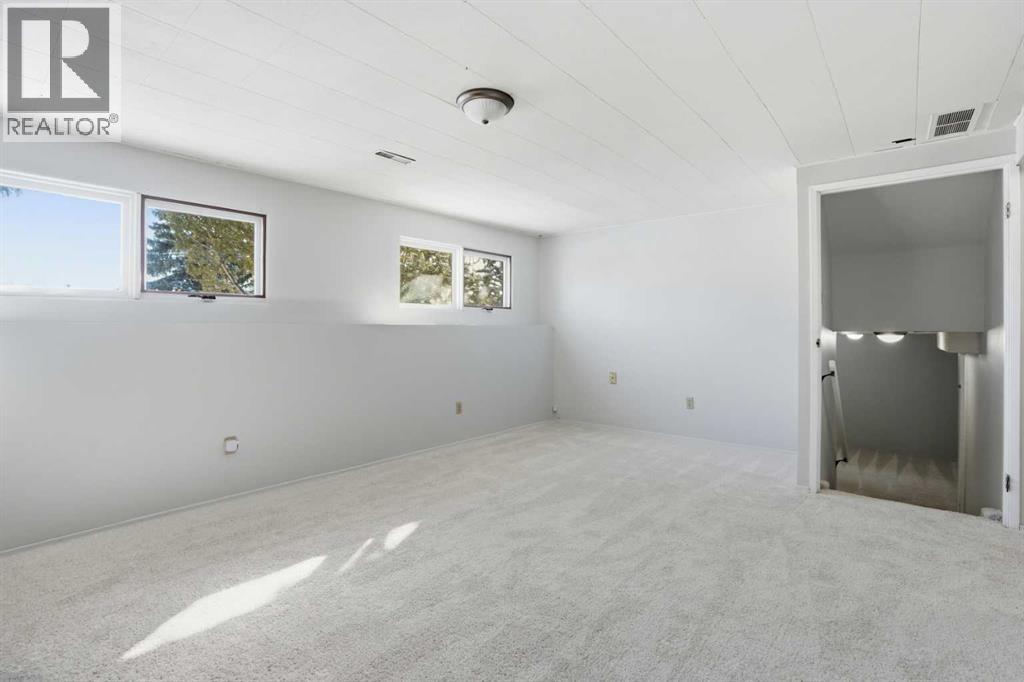 107 Nottingham Road, Calgary, Alberta  T3A 3P9 - Photo 23 - A2301234