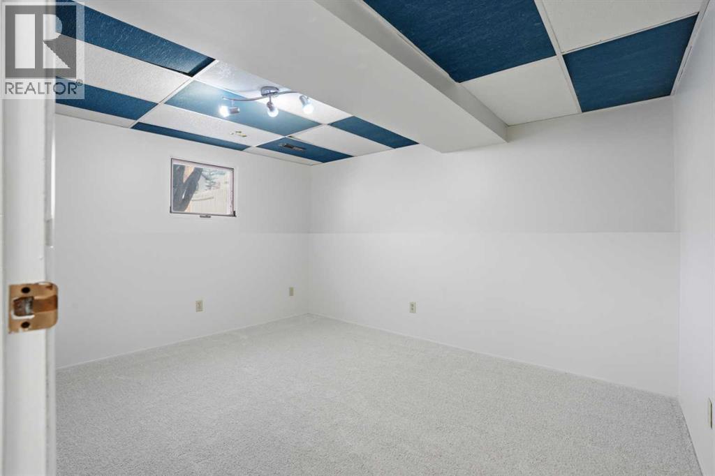 107 Nottingham Road, Calgary, Alberta  T3A 3P9 - Photo 20 - A2301234