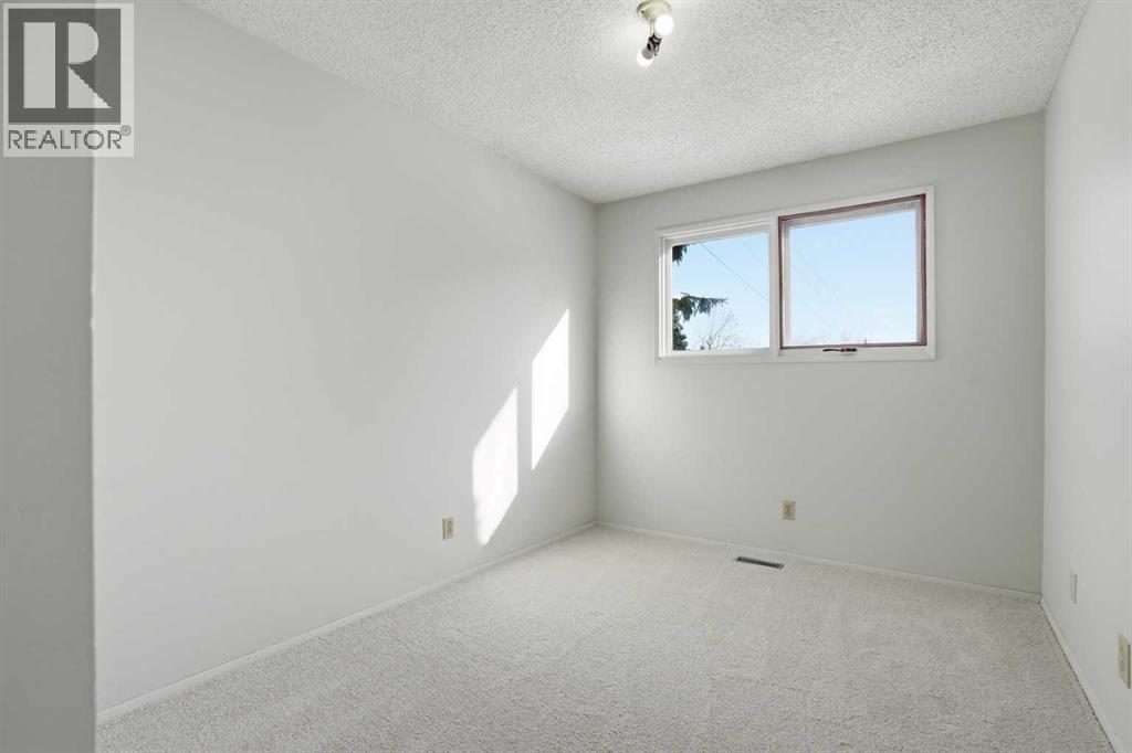 107 Nottingham Road, Calgary, Alberta  T3A 3P9 - Photo 15 - A2301234