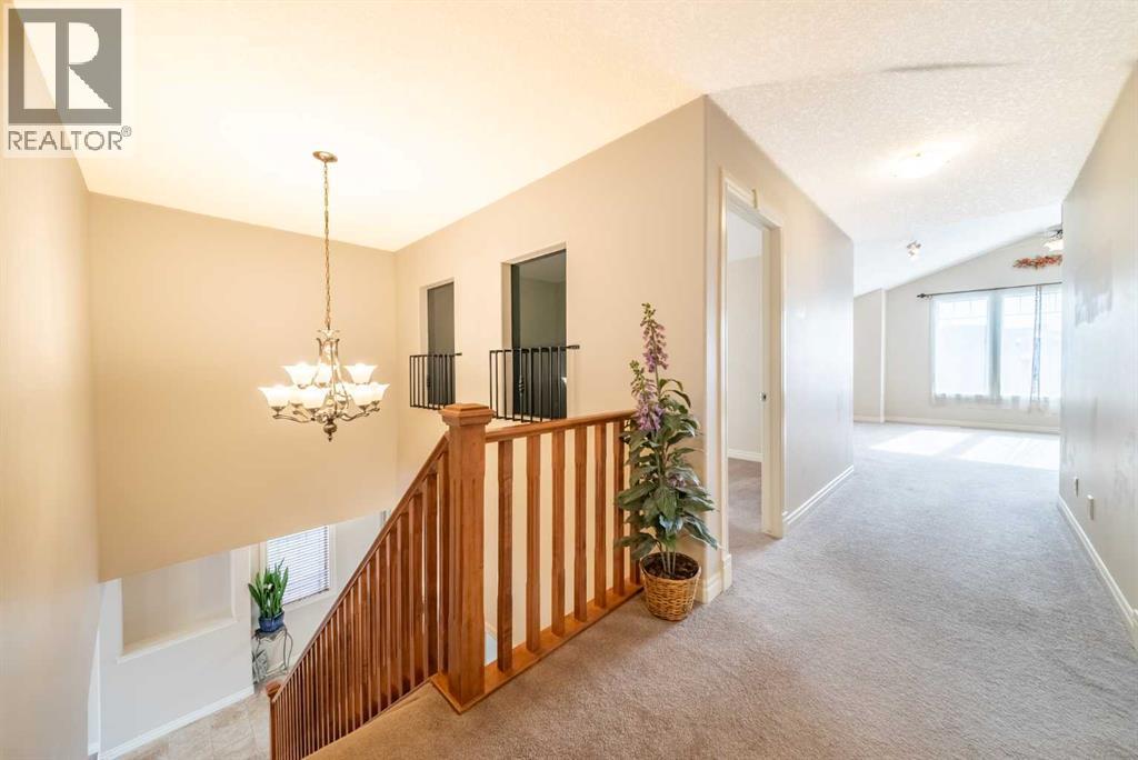 107 Panatella Close NW, Calgary, Alberta  T3K 6C6 - Photo 15 - A2293658