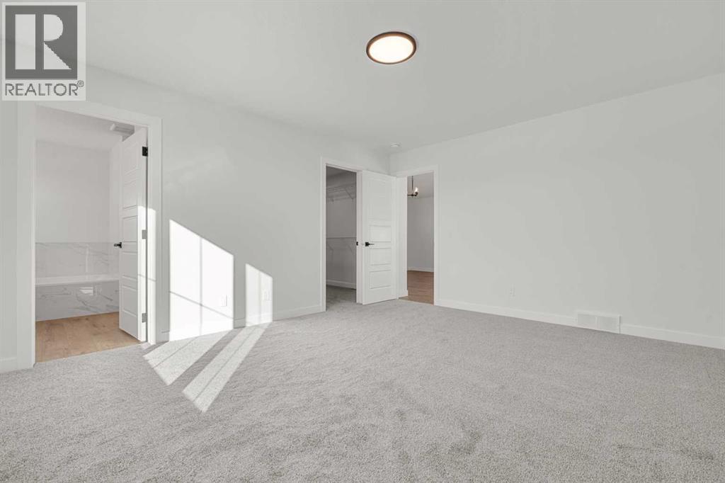 512 Lawthorn Way SE, Airdrie, Alberta  T4A 3N9 - Photo 24 - A2292536