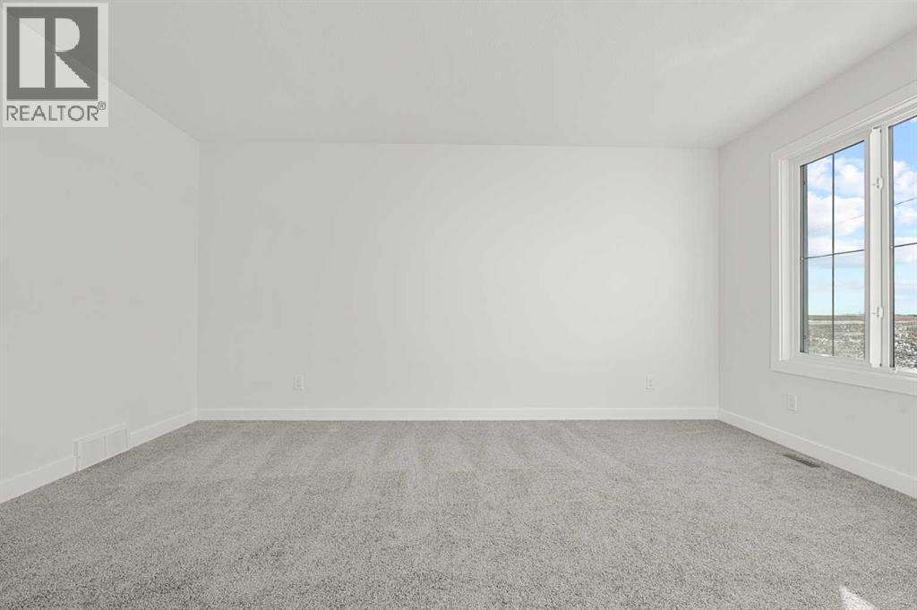 512 Lawthorn Way SE, Airdrie, Alberta  T4A 3N9 - Photo 22 - A2292536