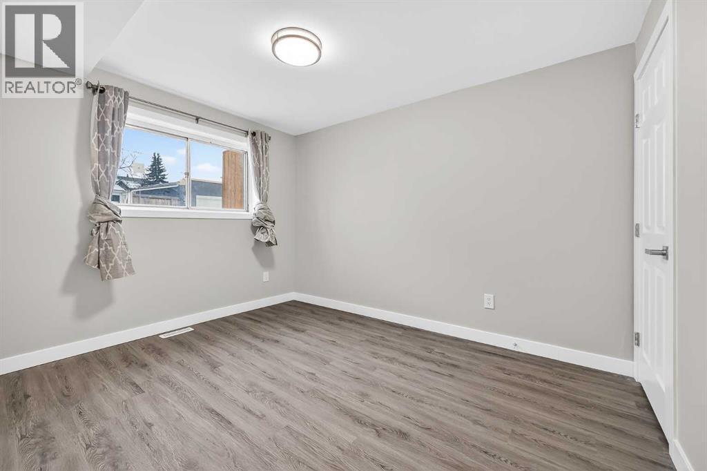 7717 & 7719 41 Avenue NW, Calgary, Alberta  T3B 1X7 - Photo 11 - A2301698