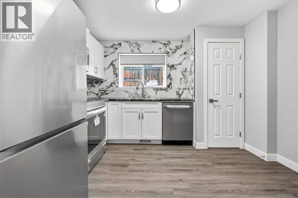 7717 & 7719 41 Avenue NW, Calgary, Alberta  T3B 1X7 - Photo 3 - A2301698