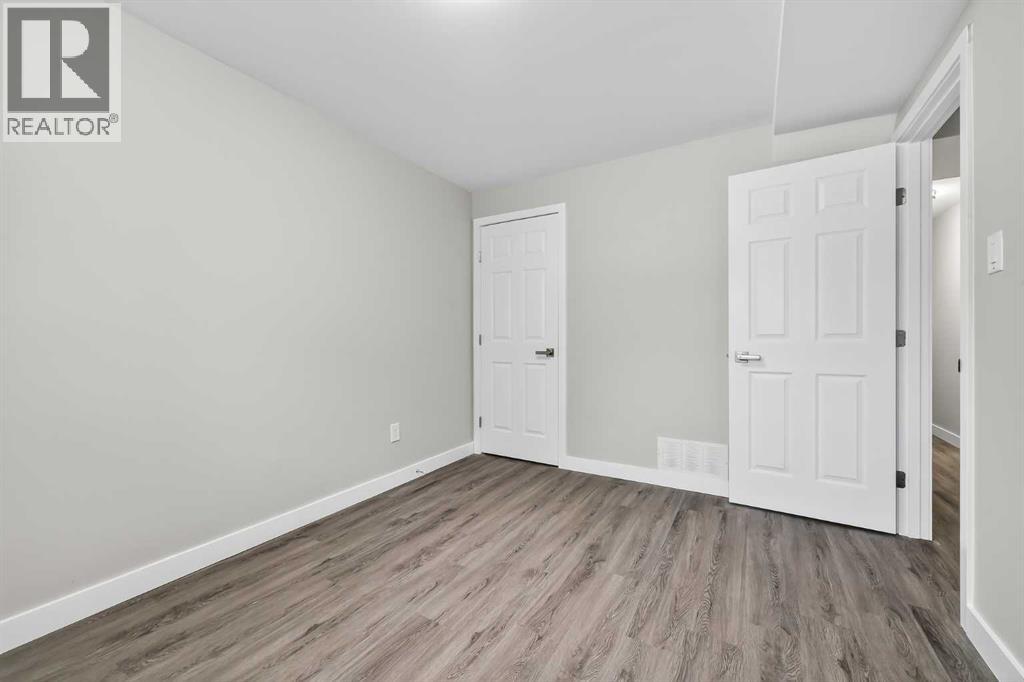 7717 & 7719 41 Avenue NW, Calgary, Alberta  T3B 1X7 - Photo 12 - A2301698