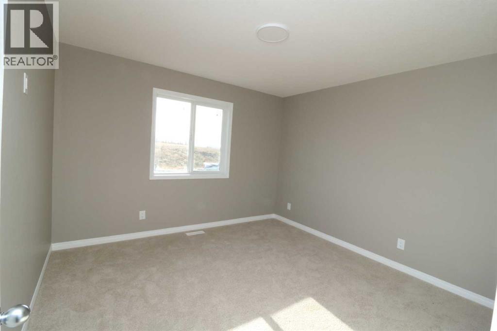 447 Henricks Drive, Irricana, Alberta  T0M 1B0 - Photo 12 - A2287250