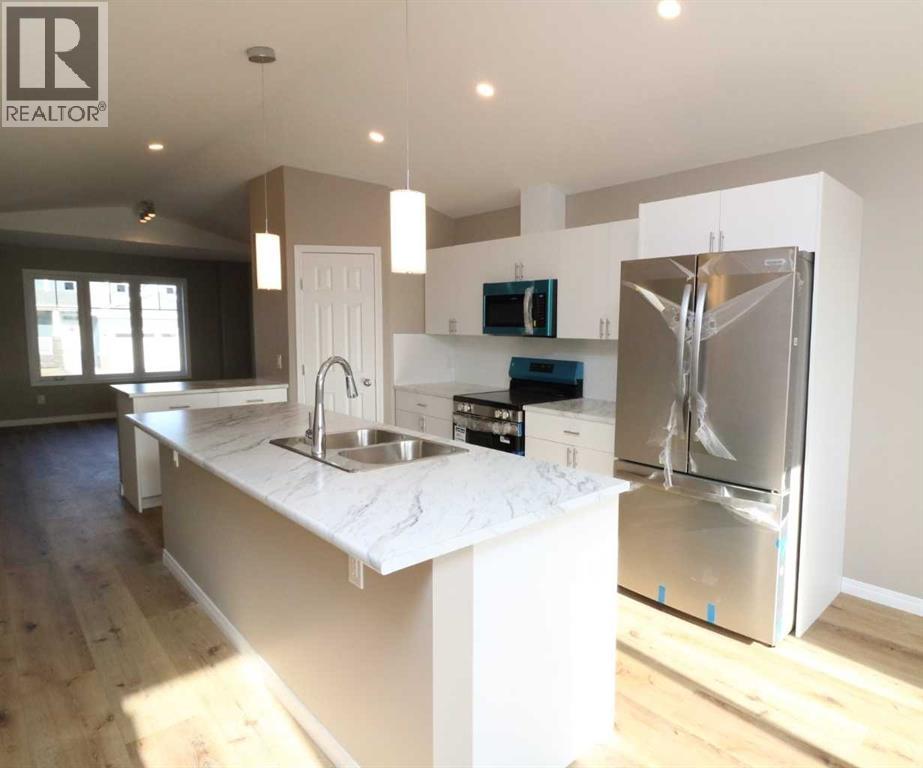 443 Henricks Drive, Irricana, Alberta  T0M 1B0 - Photo 7 - A2294712