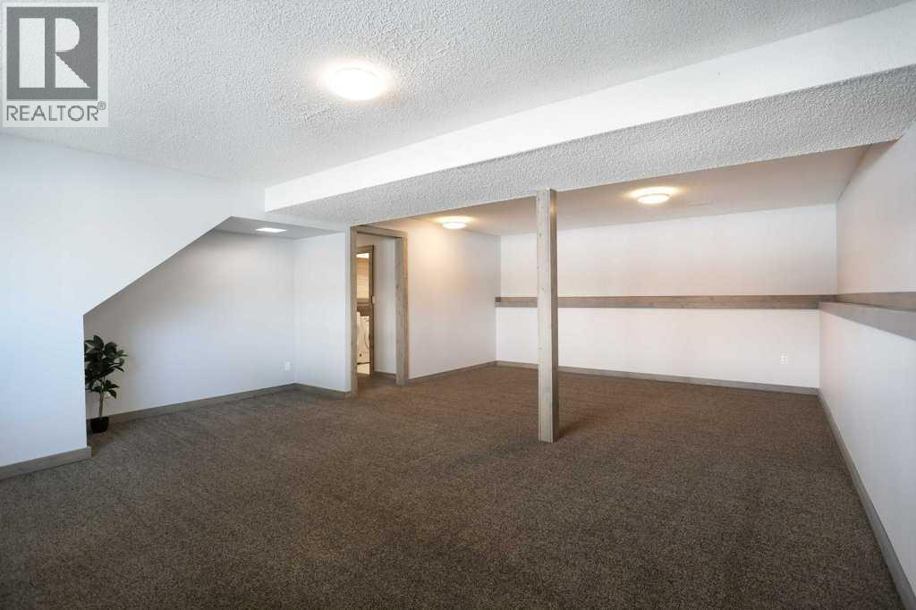 87 Dr. Anderson Park Street E, Brooks, Alberta  T1R 0K5 - Photo 31 - A2297113