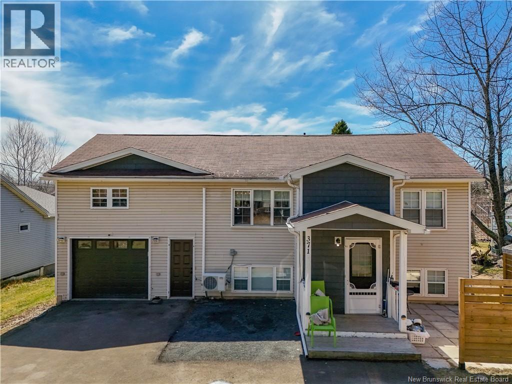 <h3>$330,000</h3><p>371 Royal Road, Fredericton, New Brunswick</p>