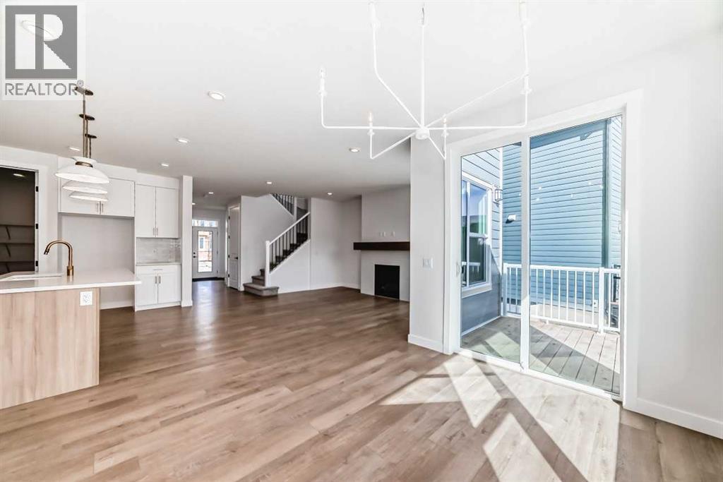 242 Harmony Circle, Rural Rocky View County, Alberta  T3Z 0K9 - Photo 4 - A2302929