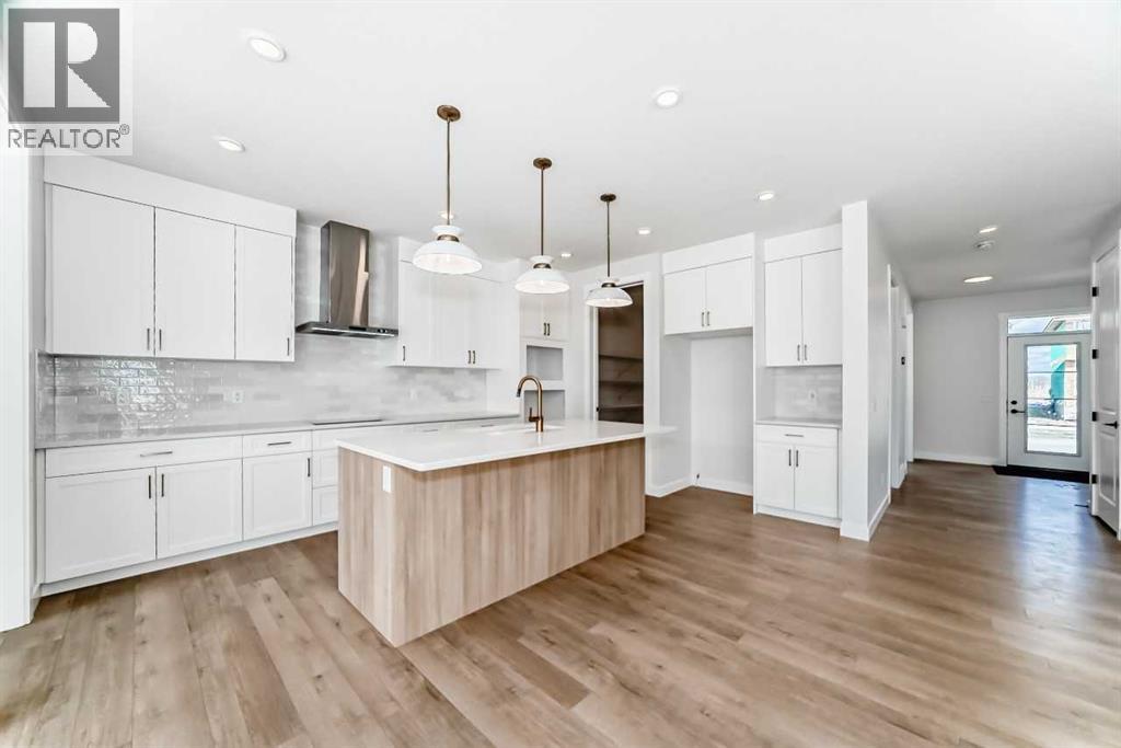 242 Harmony Circle, Rural Rocky View County, Alberta  T3Z 0K9 - Photo 3 - A2302929