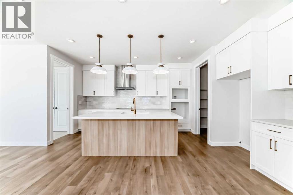 242 Harmony Circle, Rural Rocky View County, Alberta  T3Z 0K9 - Photo 2 - A2302929