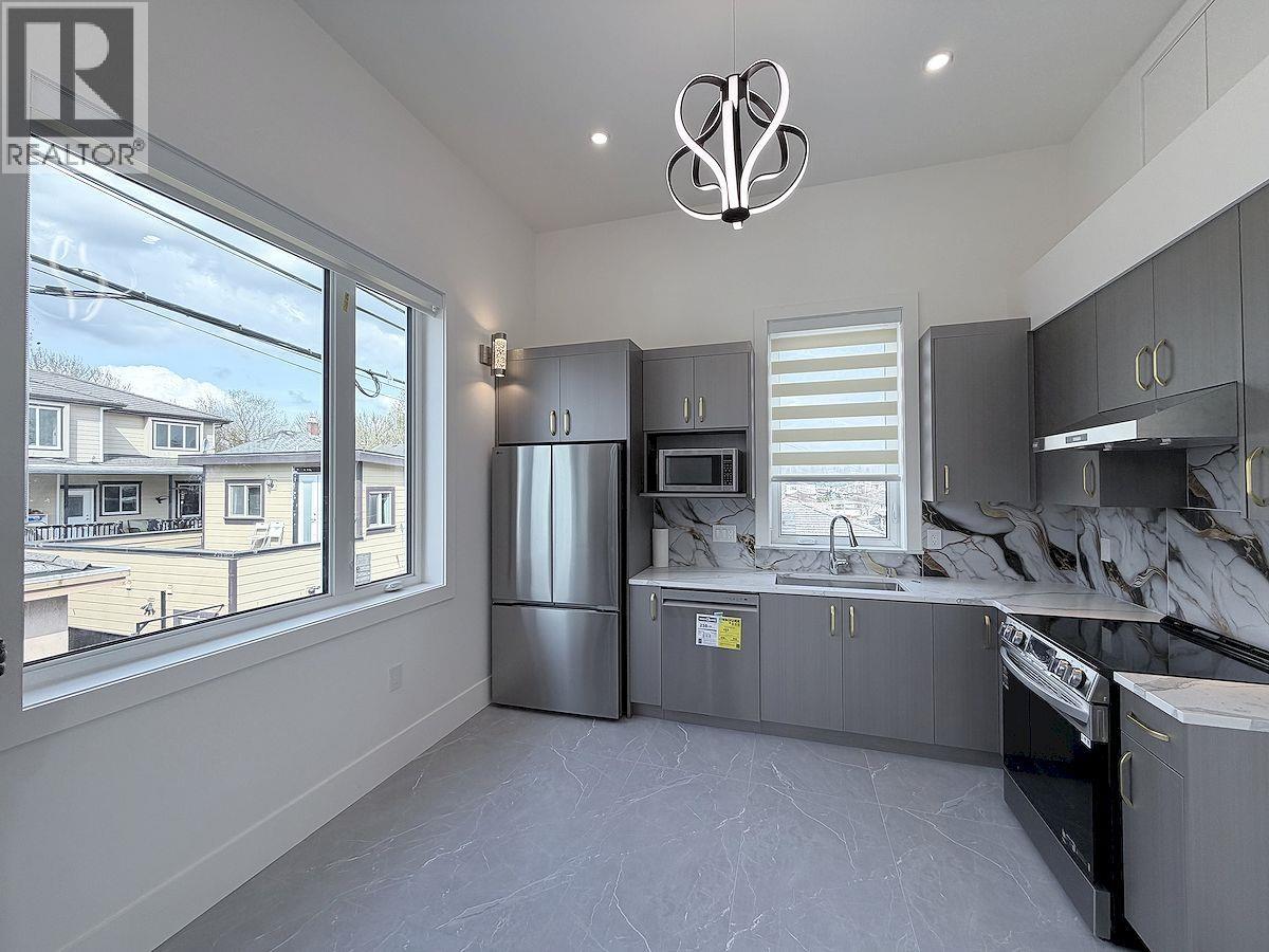 10xx E 62nd Ave Vancouver Bc, Vancouver, British Columbia  V5X 2H1 - Photo 2 - R3113221