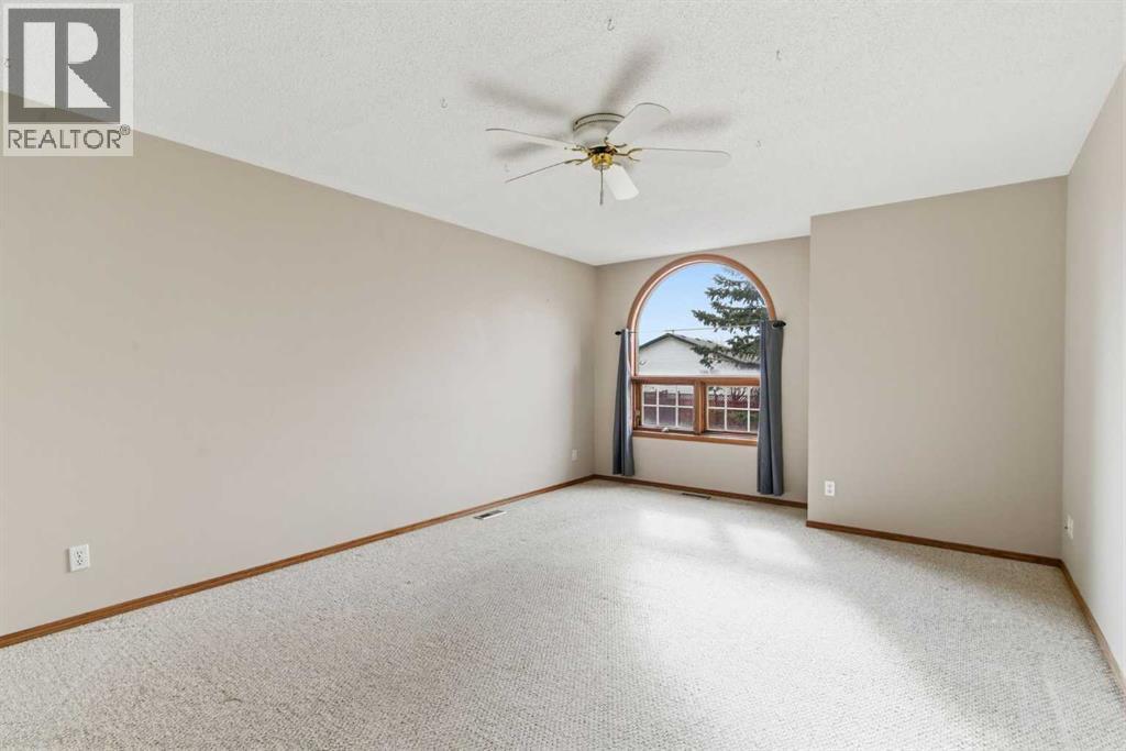 8 West Aarsby Road, Cochrane, Alberta  T4C 1M4 - Photo 6 - A2301923