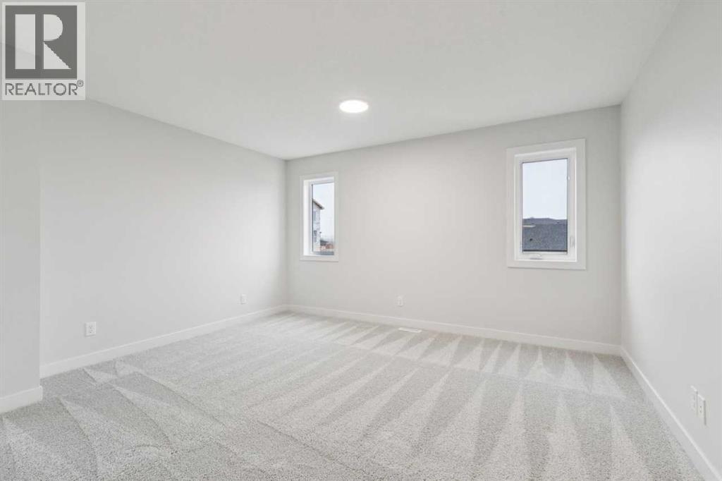 57 Southborough Square, Cochrane, Alberta  T4C 3J7 - Photo 21 - A2293227