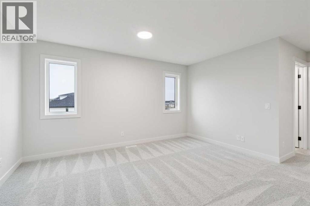 57 Southborough Square, Cochrane, Alberta  T4C 3J7 - Photo 22 - A2293227