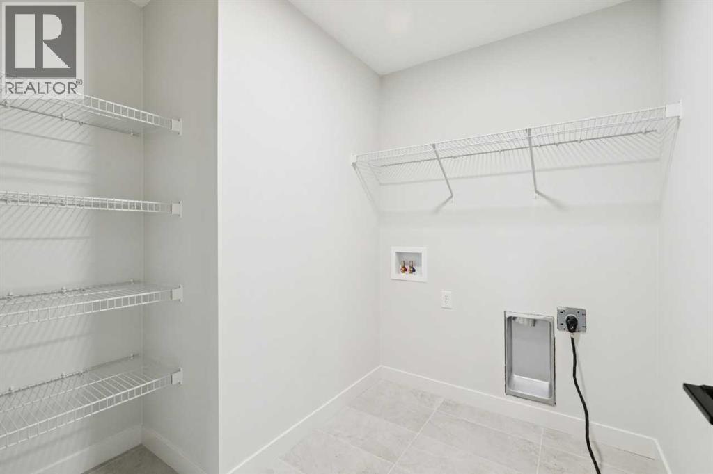 57 Southborough Square, Cochrane, Alberta  T4C 3J7 - Photo 35 - A2293227