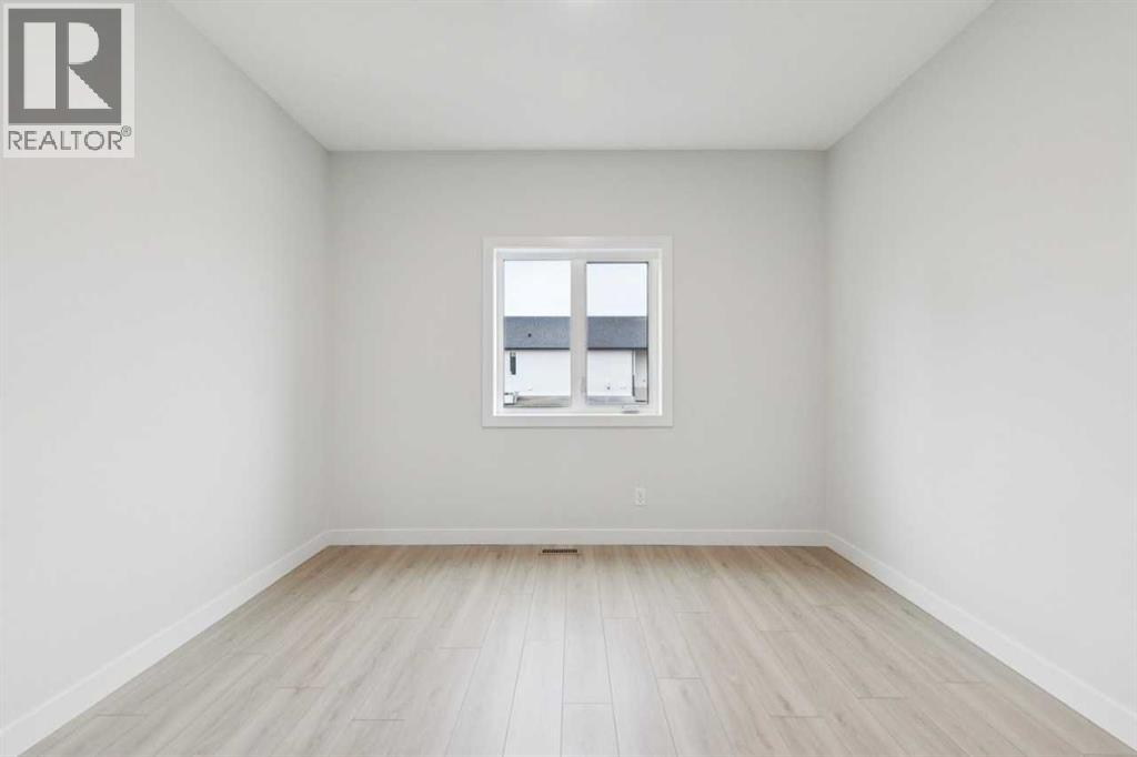 57 Southborough Square, Cochrane, Alberta  T4C 3J7 - Photo 4 - A2293227