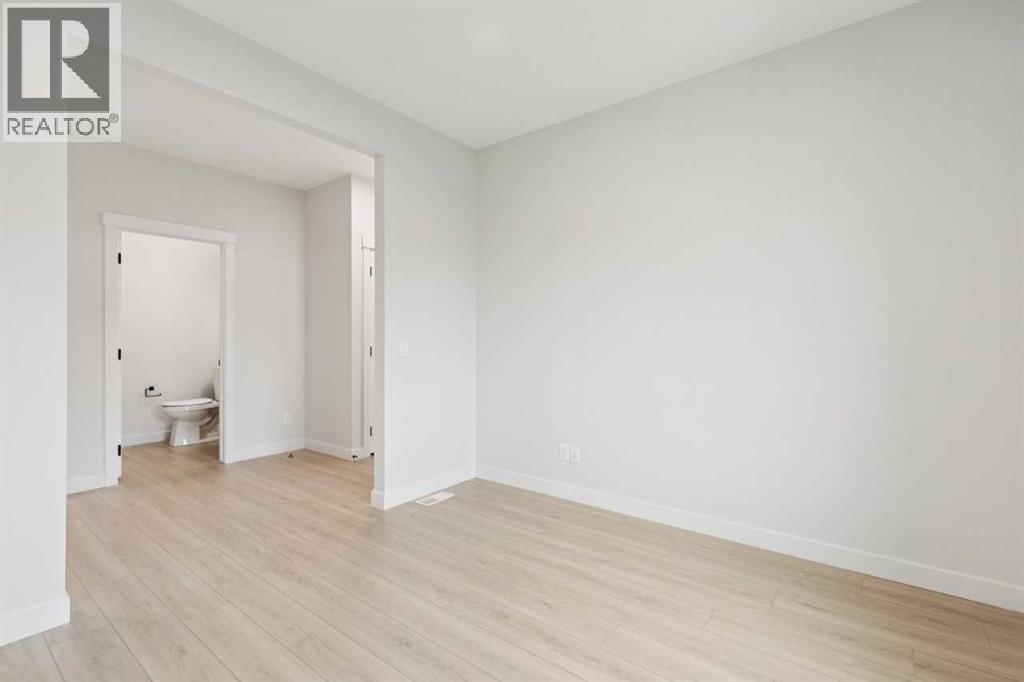 57 Southborough Square, Cochrane, Alberta  T4C 3J7 - Photo 5 - A2293227