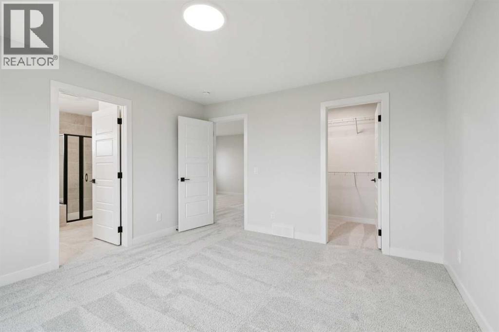 57 Southborough Square, Cochrane, Alberta  T4C 3J7 - Photo 25 - A2293227