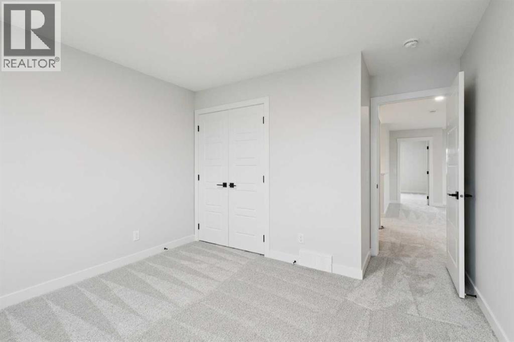 57 Southborough Square, Cochrane, Alberta  T4C 3J7 - Photo 34 - A2293227