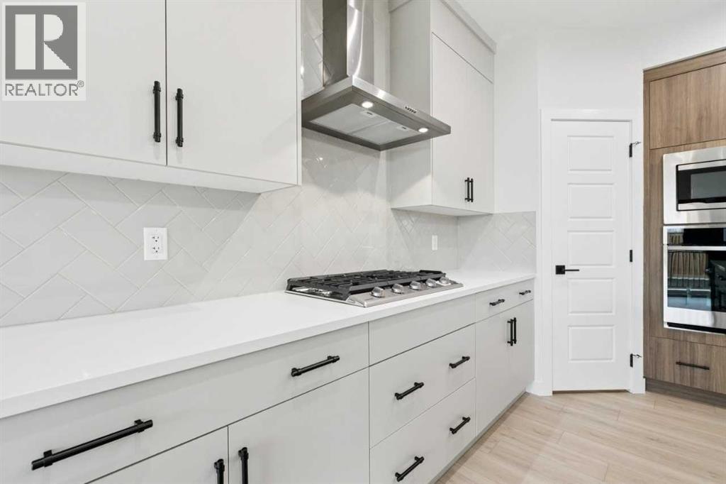 57 Southborough Square, Cochrane, Alberta  T4C 3J7 - Photo 9 - A2293227