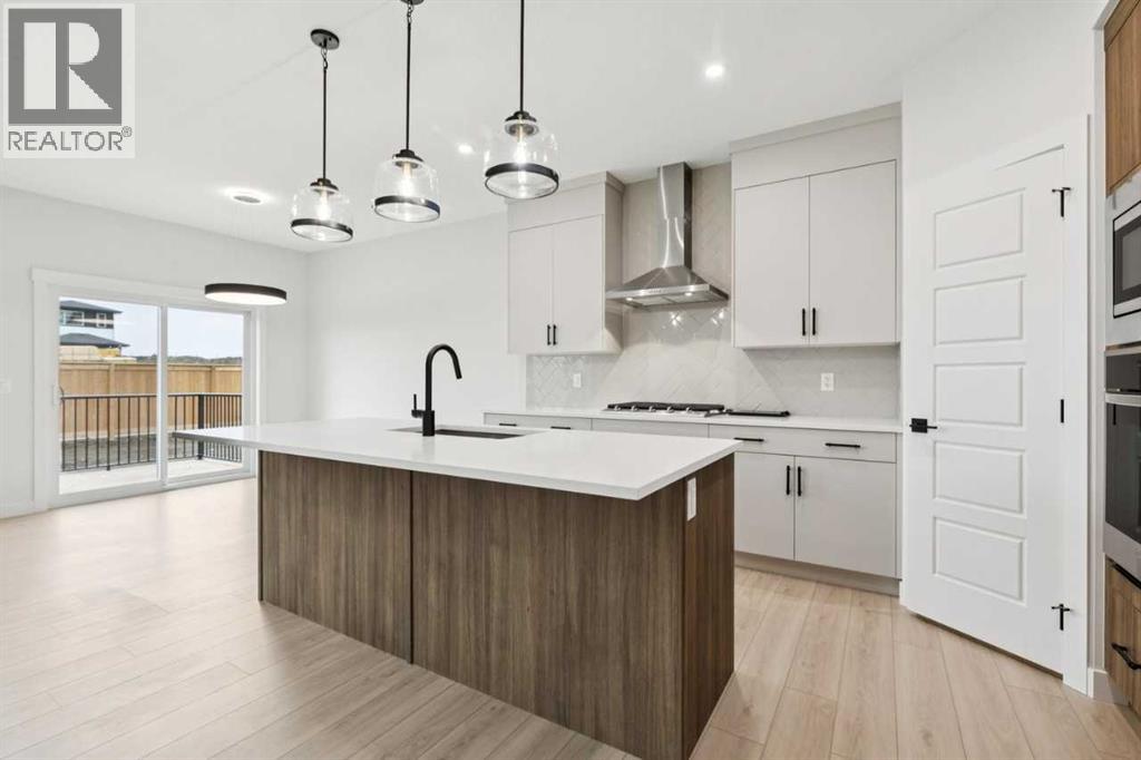 57 Southborough Square, Cochrane, Alberta  T4C 3J7 - Photo 6 - A2293227