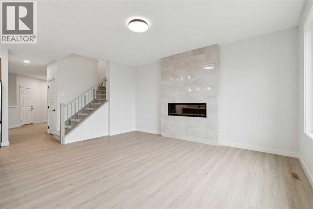 57 Southborough Square, Cochrane, Alberta  T4C 3J7 - Photo 14 - A2293227