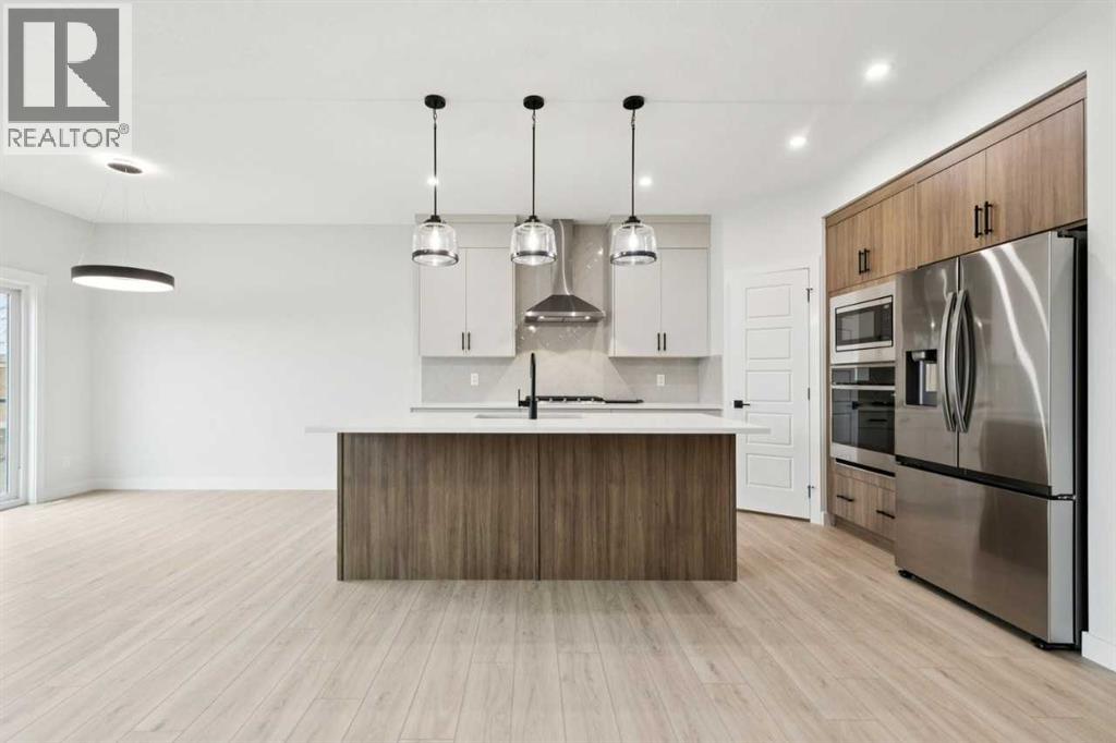 57 Southborough Square, Cochrane, Alberta  T4C 3J7 - Photo 8 - A2293227