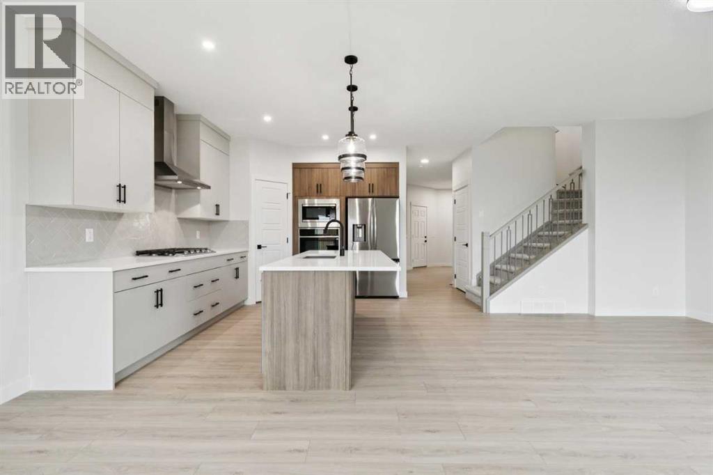 57 Southborough Square, Cochrane, Alberta  T4C 3J7 - Photo 12 - A2293227