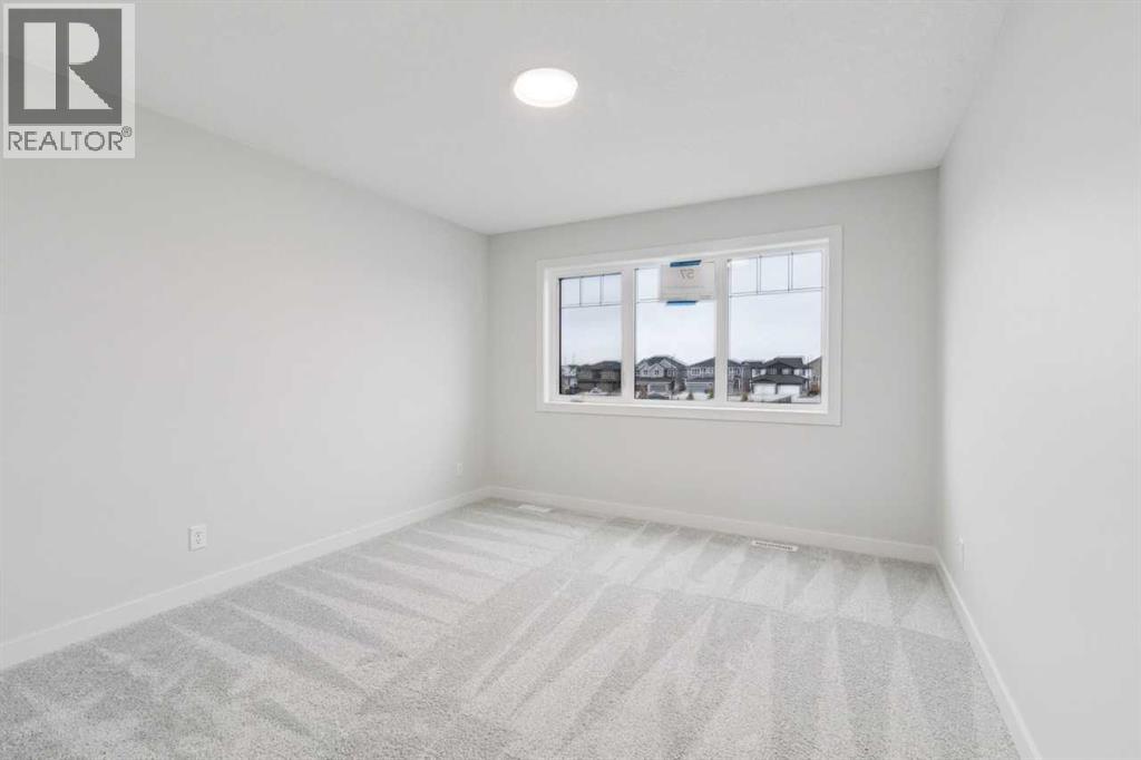 57 Southborough Square, Cochrane, Alberta  T4C 3J7 - Photo 31 - A2293227