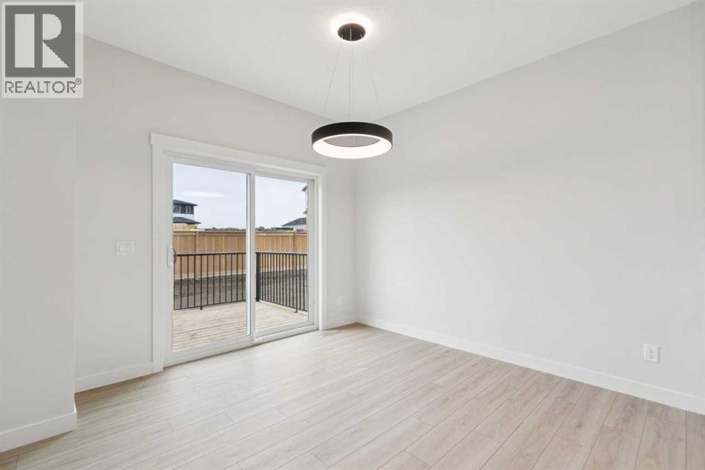 57 Southborough Square, Cochrane, Alberta  T4C 3J7 - Photo 17 - A2293227