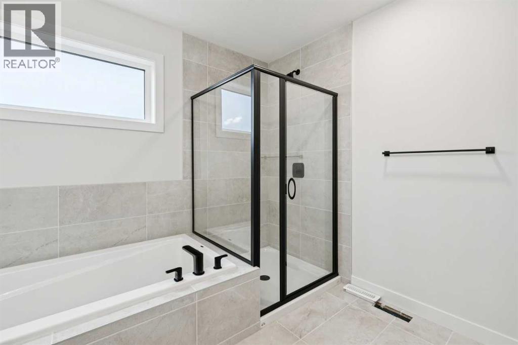 57 Southborough Square, Cochrane, Alberta  T4C 3J7 - Photo 29 - A2293227