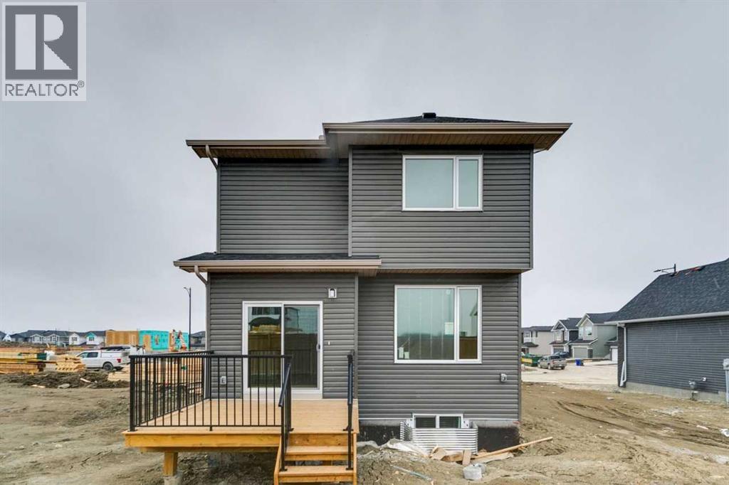 57 Southborough Square, Cochrane, Alberta  T4C 3J7 - Photo 37 - A2293227