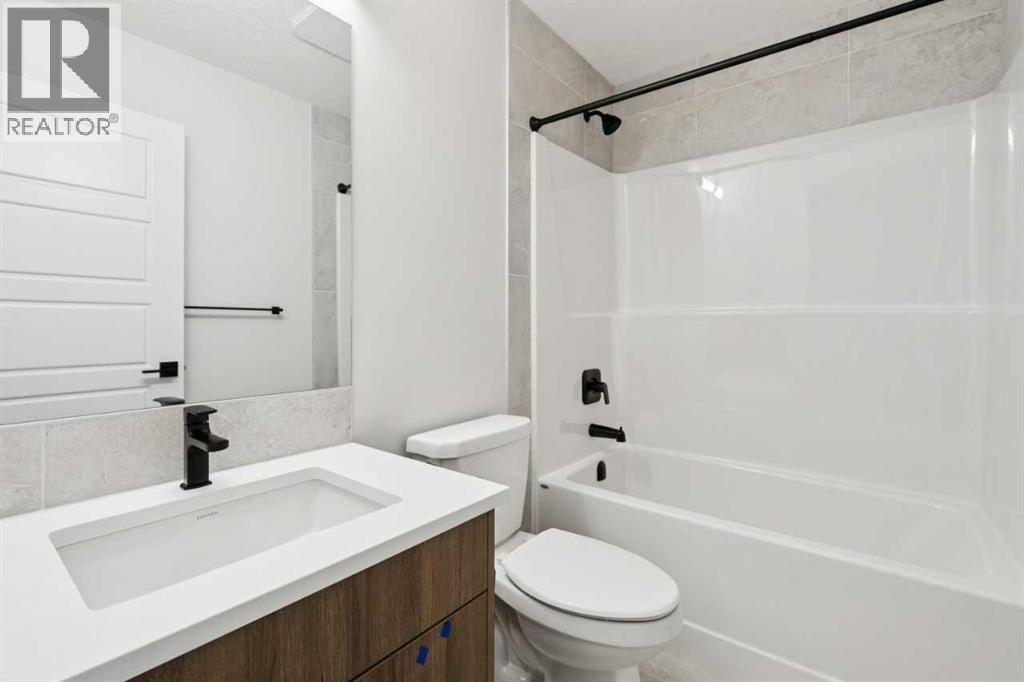 57 Southborough Square, Cochrane, Alberta  T4C 3J7 - Photo 36 - A2293227