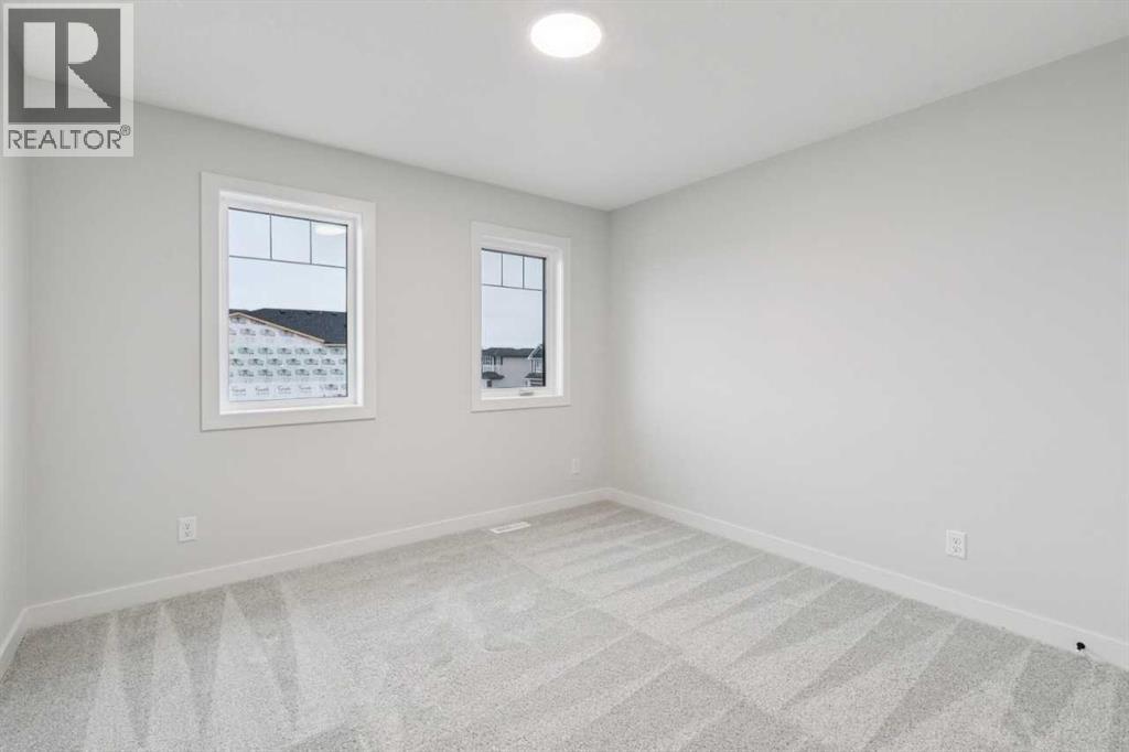 57 Southborough Square, Cochrane, Alberta  T4C 3J7 - Photo 33 - A2293227