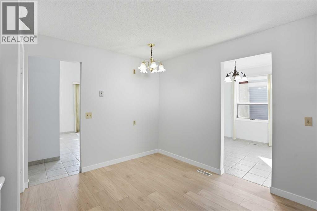 107 Nottingham Road, Calgary, Alberta  T2K 5R2 - Photo 8 - A2301234