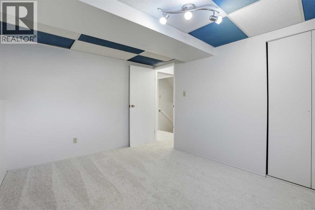 107 Nottingham Road, Calgary, Alberta  T2K 5R2 - Photo 22 - A2301234