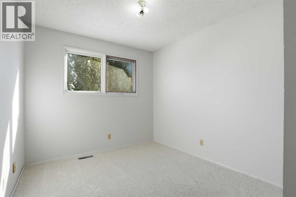 107 Nottingham Road, Calgary, Alberta  T2K 5R2 - Photo 17 - A2301234