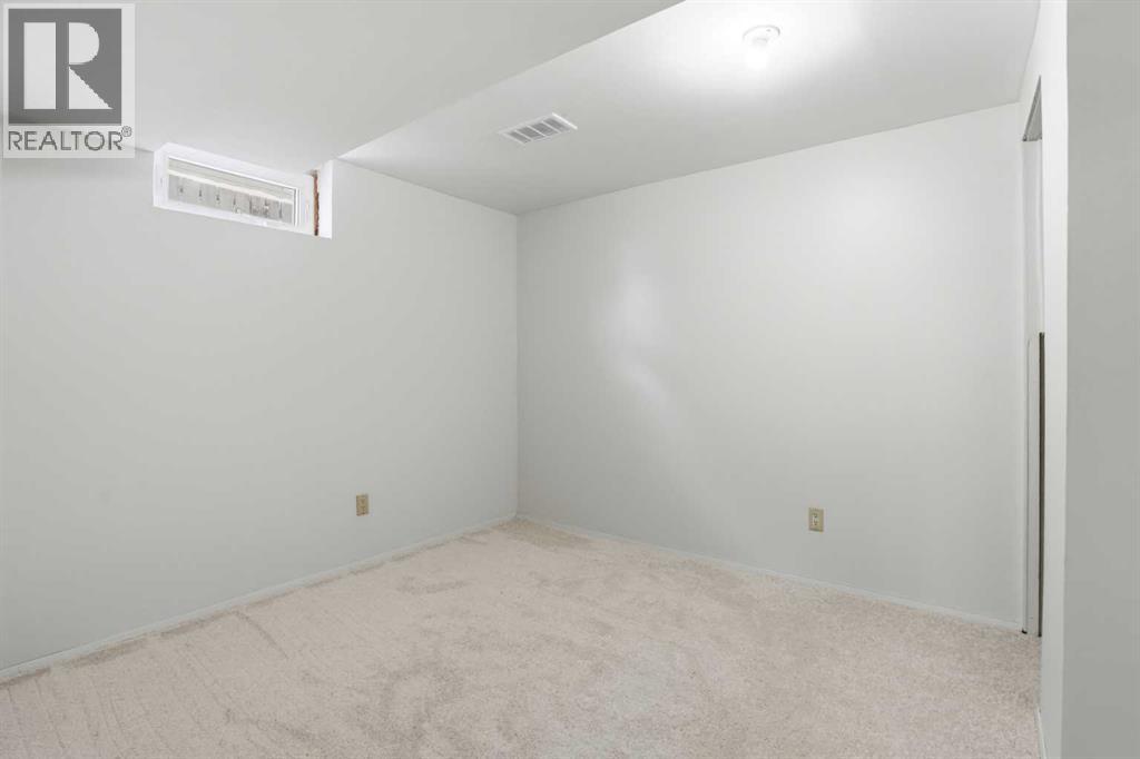 107 Nottingham Road, Calgary, Alberta  T2K 5R2 - Photo 28 - A2301234