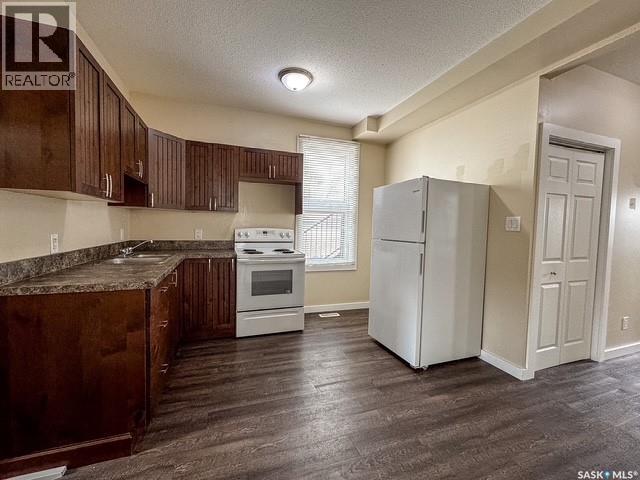 614 7th Avenue Ne, Swift Current, Saskatchewan  S9H 2M4 - Photo 5 - SK033270