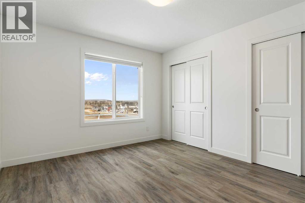 102, 24 Rivercrest Drive, Cochrane, Alberta  T4C 2C5 - Photo 32 - A2302535