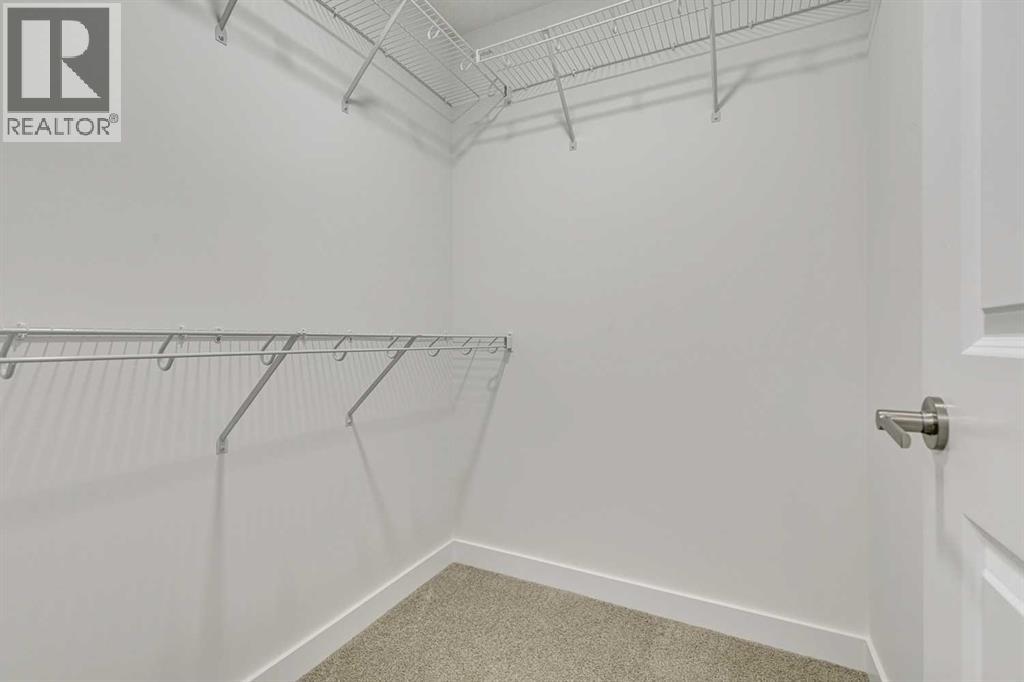 208 Belmont Way Sw, Calgary, Alberta  T2X 5T5 - Photo 9 - A2302201