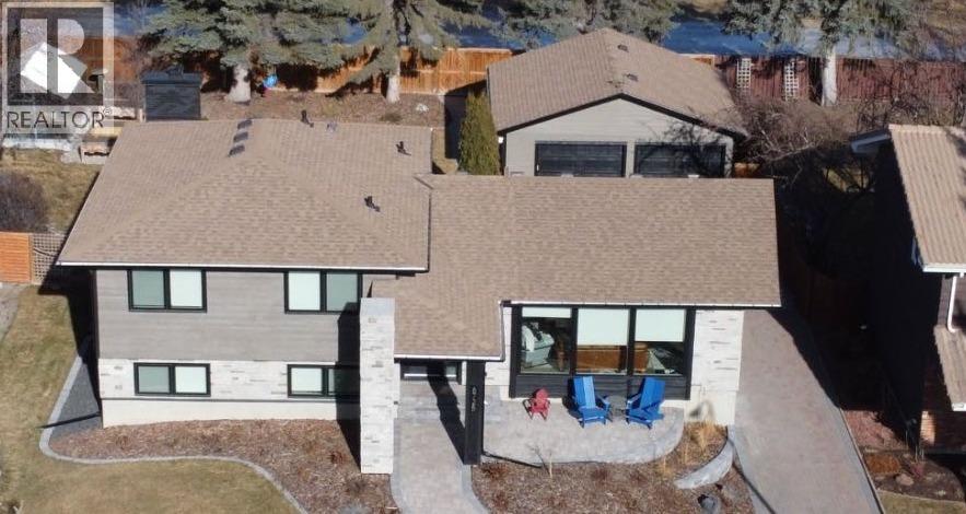 6725 Livingstone Drive SW, Calgary, Alberta  T3E 6J2 - Photo 1 - A2286743