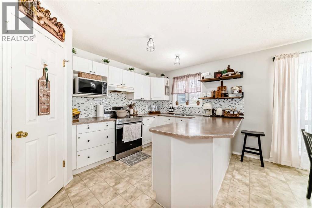 155 Erin Meadow Way Se, Calgary, Alberta  T2B 3P7 - Photo 7 - A2297998