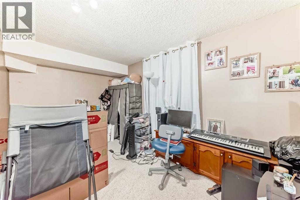 155 Erin Meadow Way Se, Calgary, Alberta  T2B 3P7 - Photo 34 - A2297998