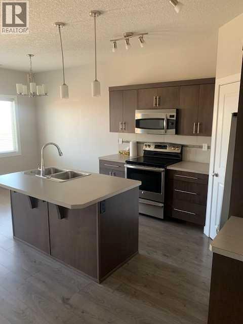 1, 346 Mt Sundance Landing W, Lethbridge, Alberta  T1J 5H9 - Photo 4 - A2303484